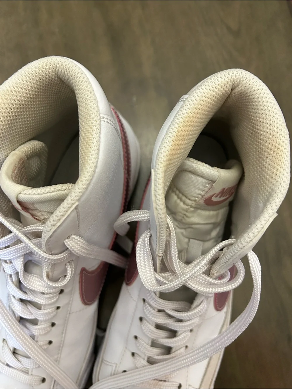 Nike High-Top Sneakers in White with Pink Swoosh